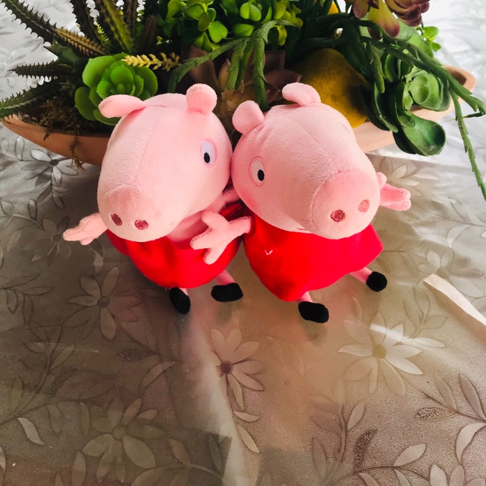 Two peppa pig plush toys